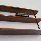 Shelves in rosewood and black lacquered metal from the 50s