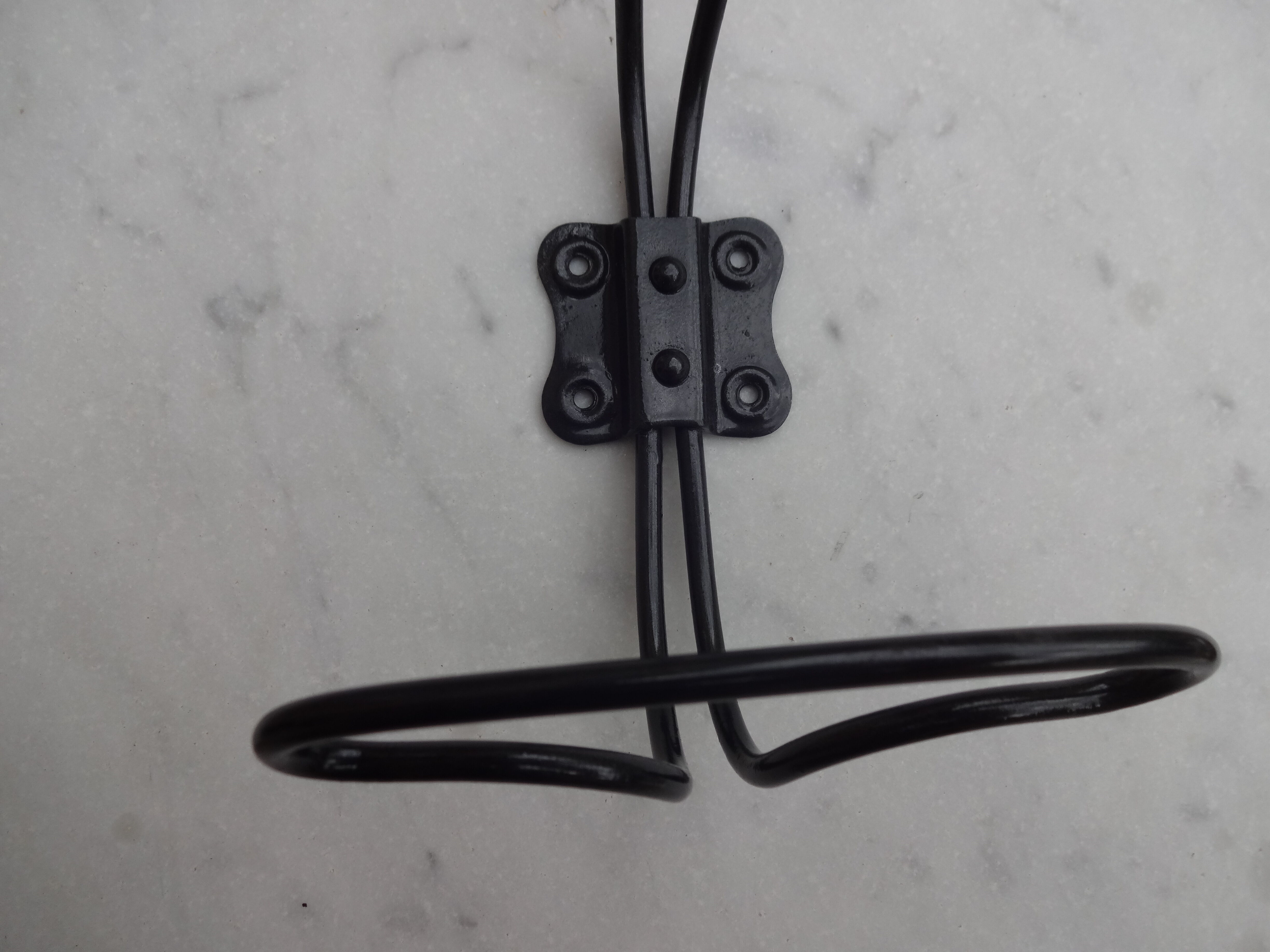 Vintage coat in black lacquered iron wire