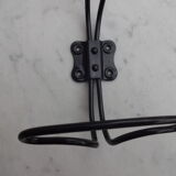 Vintage coat in black lacquered iron wire