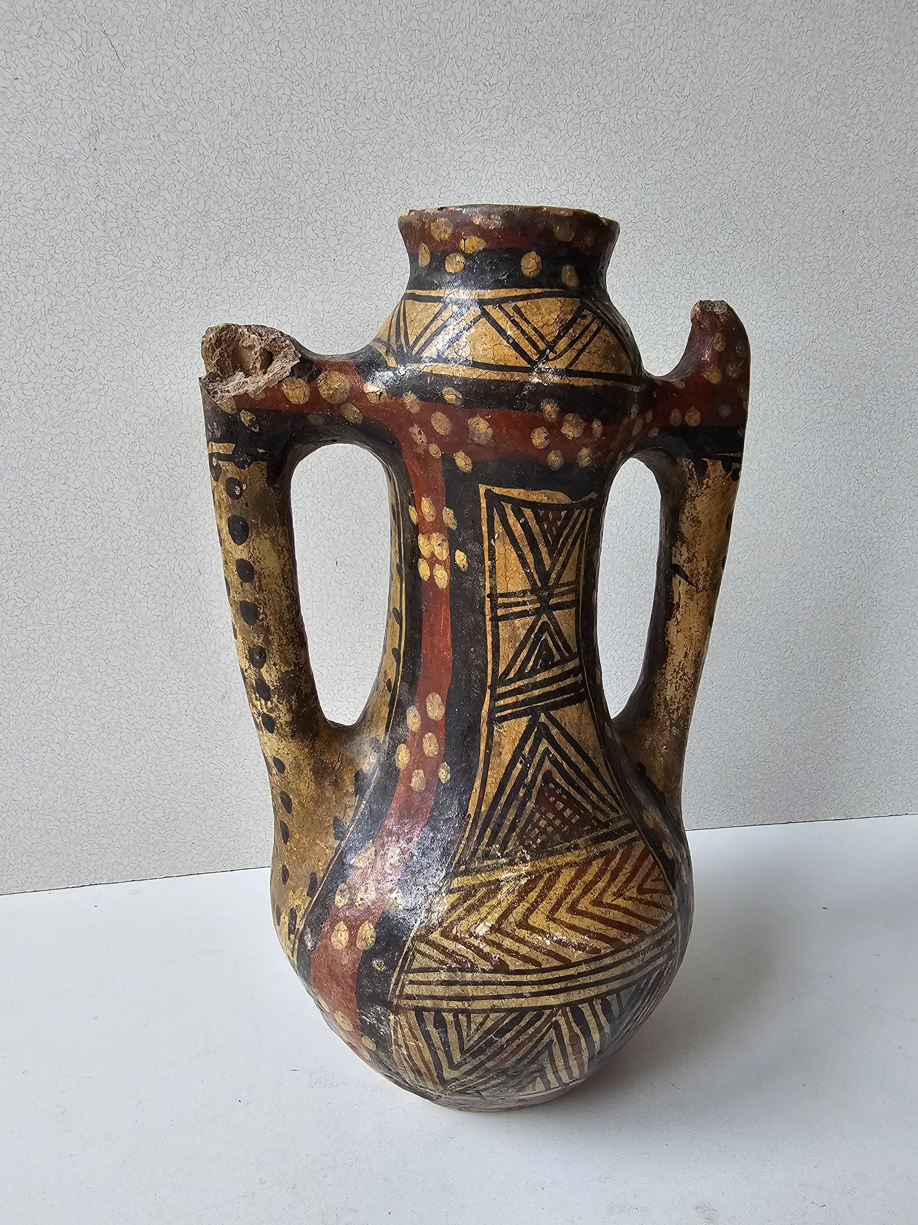 Kabyle Algerian pottery oil jar with polychrome geometric decorations