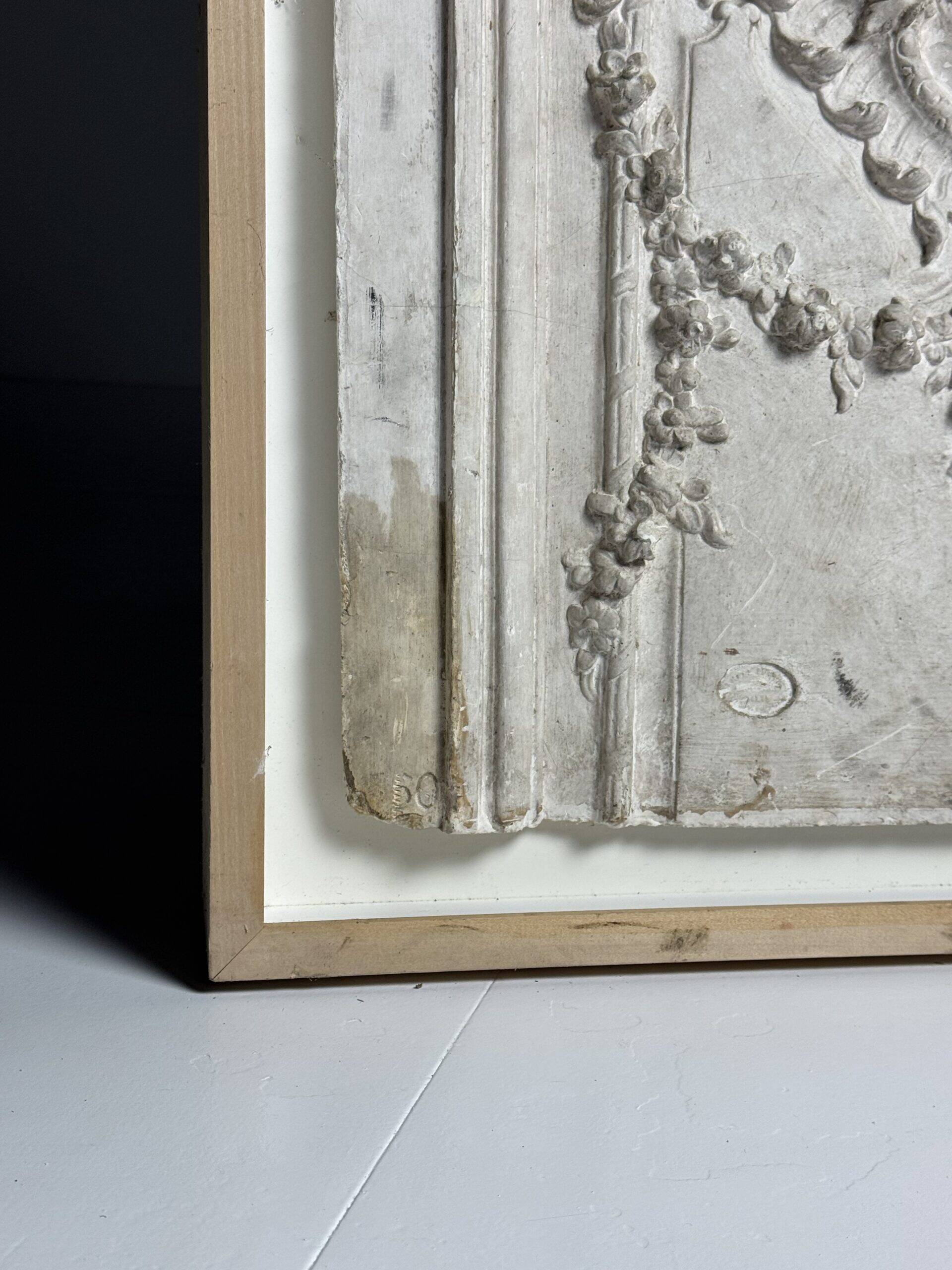 Plaster ceiling fragment framed