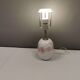 Table lamp in white and rose coloured glass designed by Michael Bang and manufactured by Holmegaard.