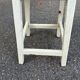 Rustic square farmhouse stool in patinated white wood from the 1960s.