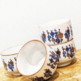 4 tea cups with delicate floral pattern