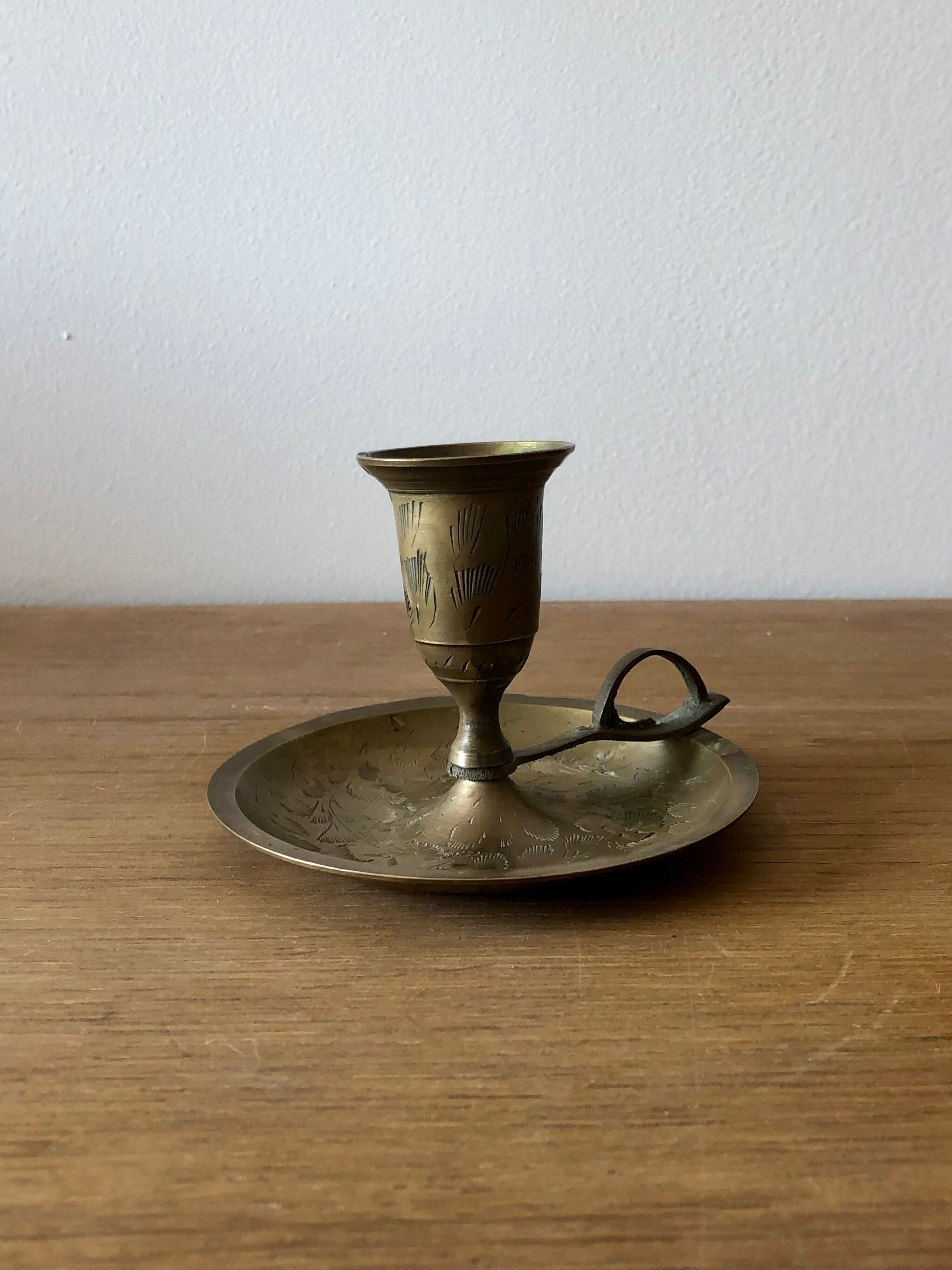 Brass hand candle holder