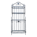 Old wrought iron garden shelf for plants