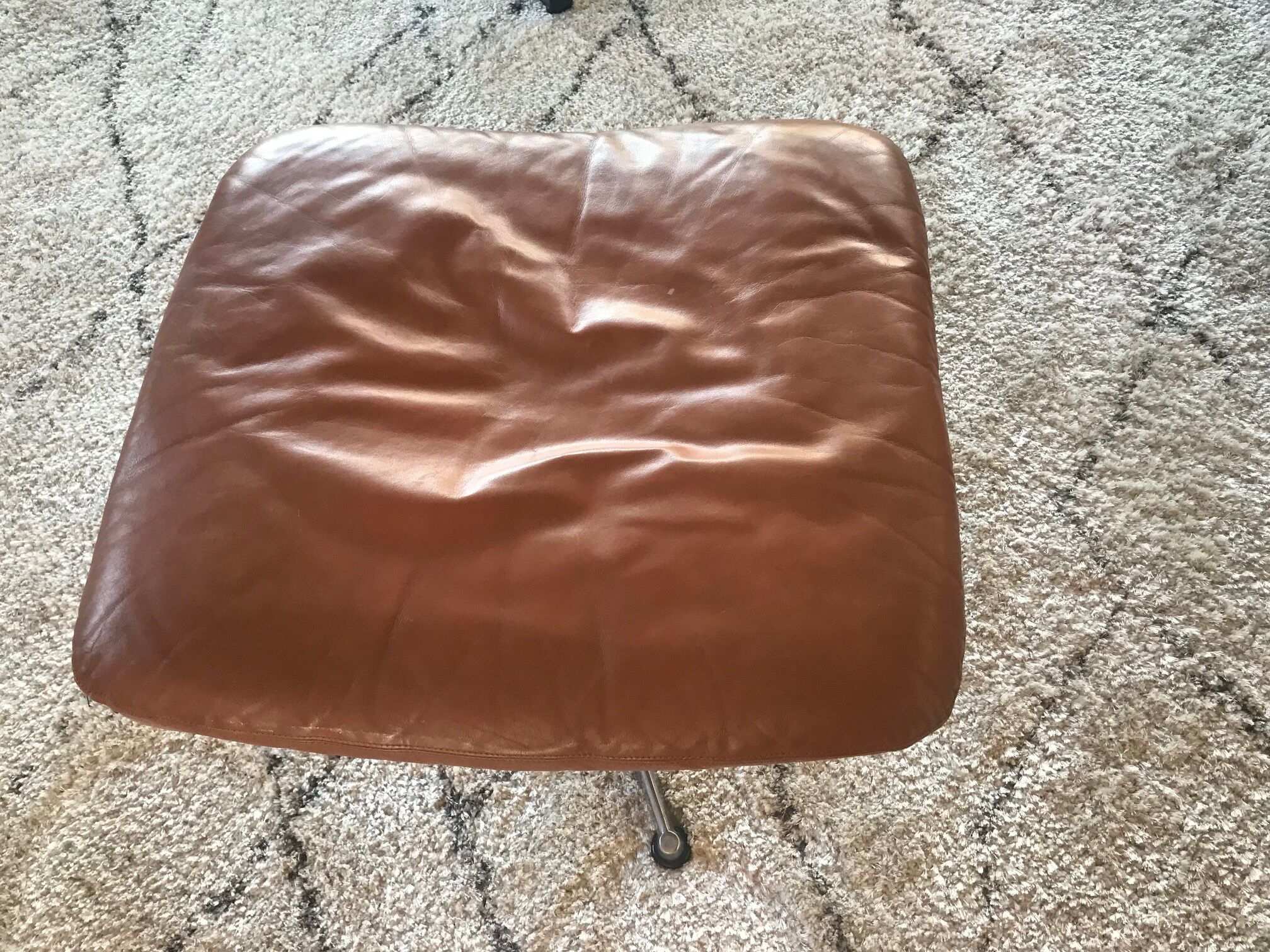 Ottoman model " King" in brown whiskey leather by Roger Vandenbeuck for Strassle , SWITZERLAND