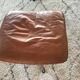 Ottoman model " King" in brown whiskey leather by Roger Vandenbeuck for Strassle , SWITZERLAND