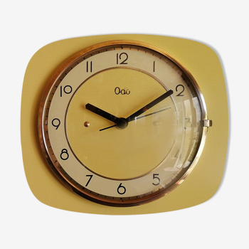 Clock formica vintage silent wall pendulum "Yellow Odo"