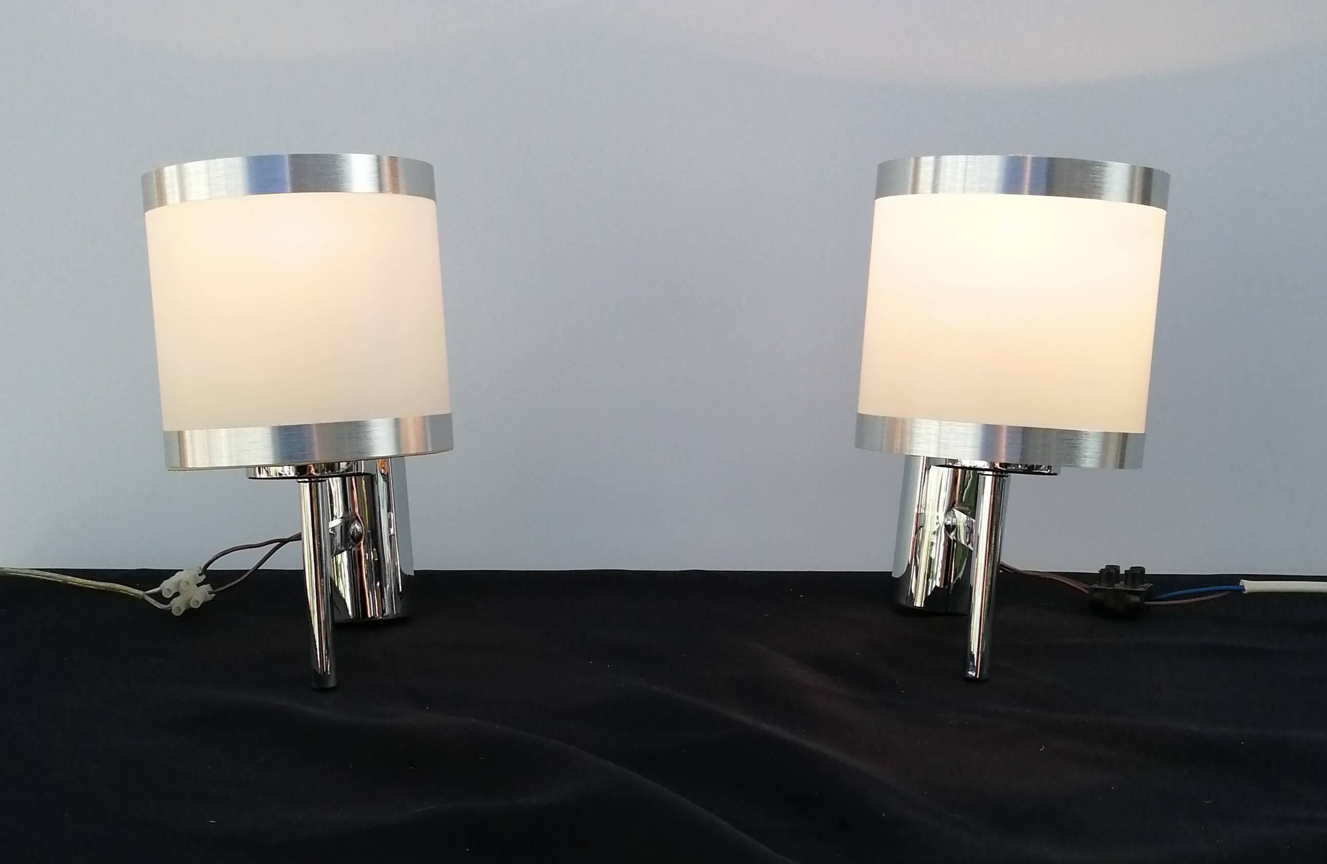 Pair of chrome design wall lights and vintage white hat 1970