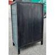 Restored antique Vietnamese wardrobe with care.