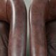 Set of two cowhide club armchairs in good condition with a English design
