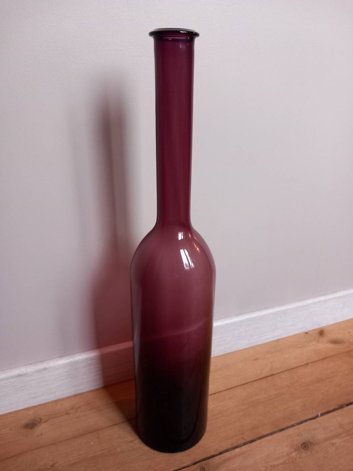 Large glass bottle