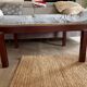 Table basse bois et laiton avec planisphère sous verre