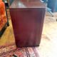 Meuble vintage musique placage acajou sur roulettes