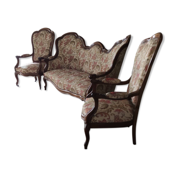 Three-piece walnut living room set consisting of two armchairs and one sofa