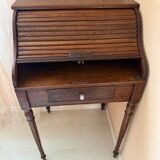 Pretty little secretary with a curtain.