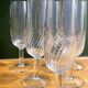 6 clear glass champagne flutes in very good condition
