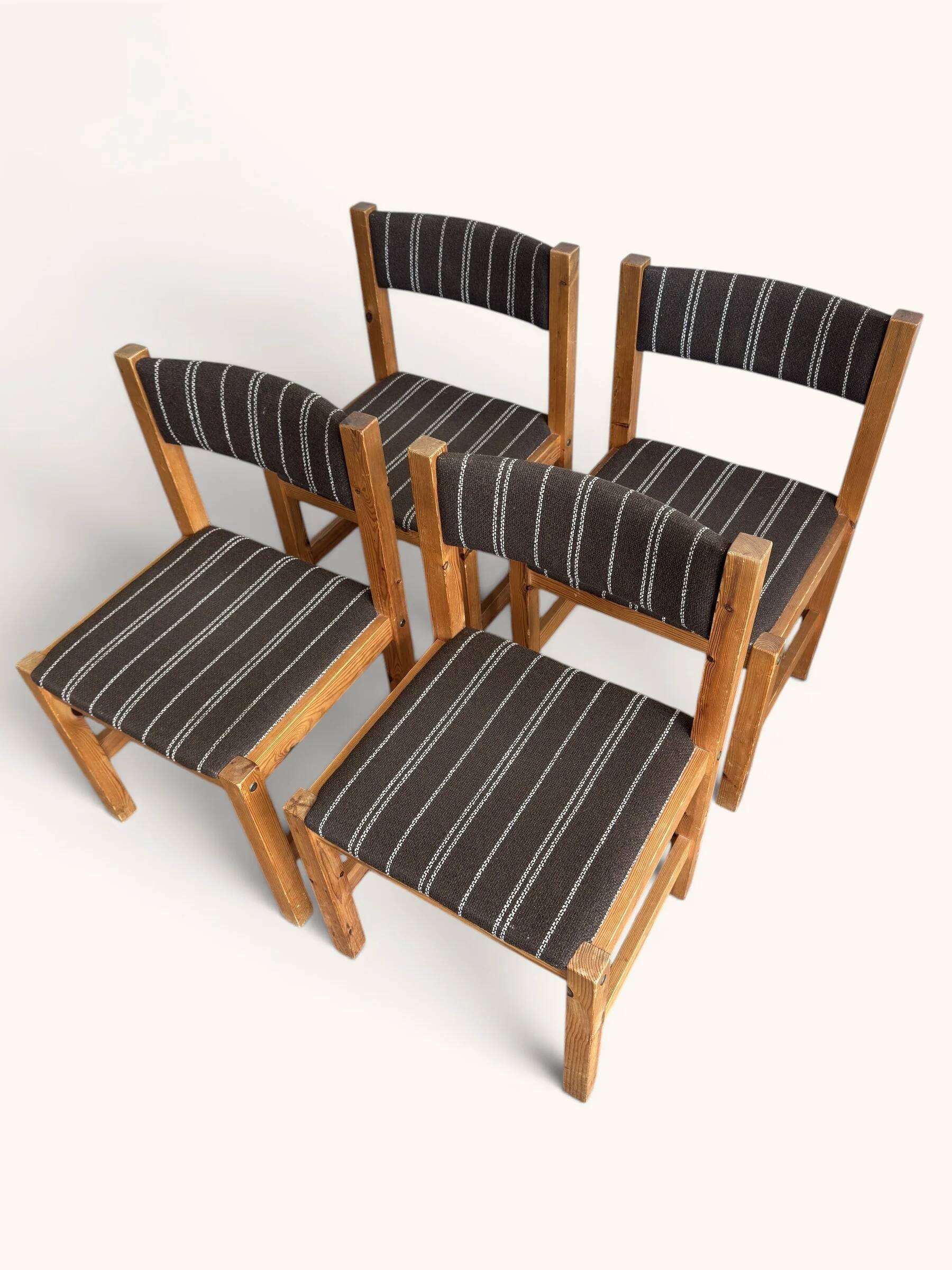 Set of 4 Danish dining chairs with brown striped upholstery.