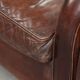 Dark cognac-coloured set of 2 sheepskin armchairs with a sleek design