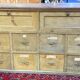 Old workshop furniture in good condition. 8 drawers and 2 drop-down doors, very