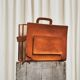 Trompe-l'Oeil magazine rack 'Actentasche' in patinated leather and canvas