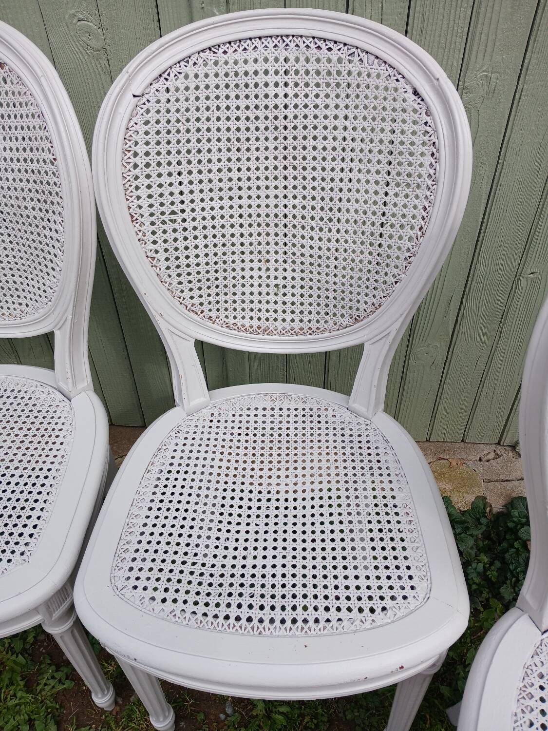 4 old wooden and cane chairs