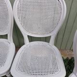 4 old wooden and cane chairs