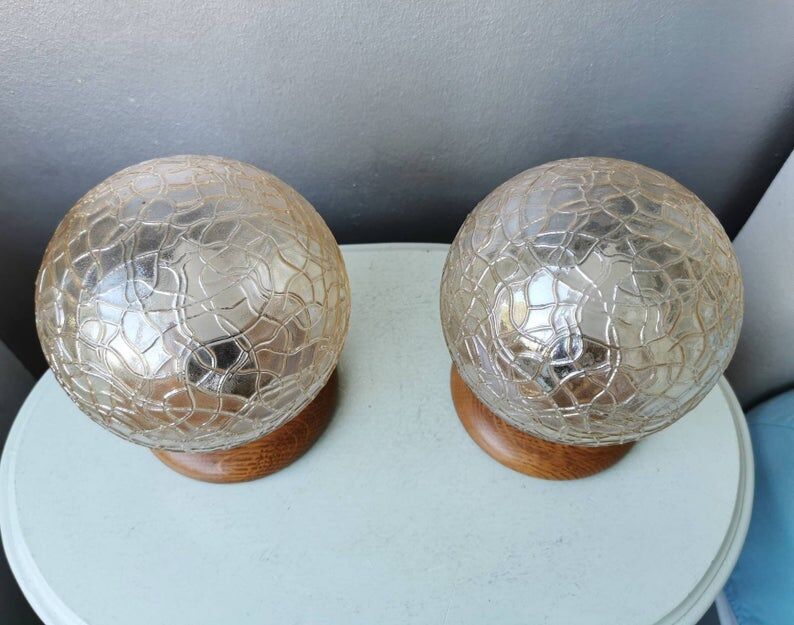 Wooden table lights with 70s gold glass hood