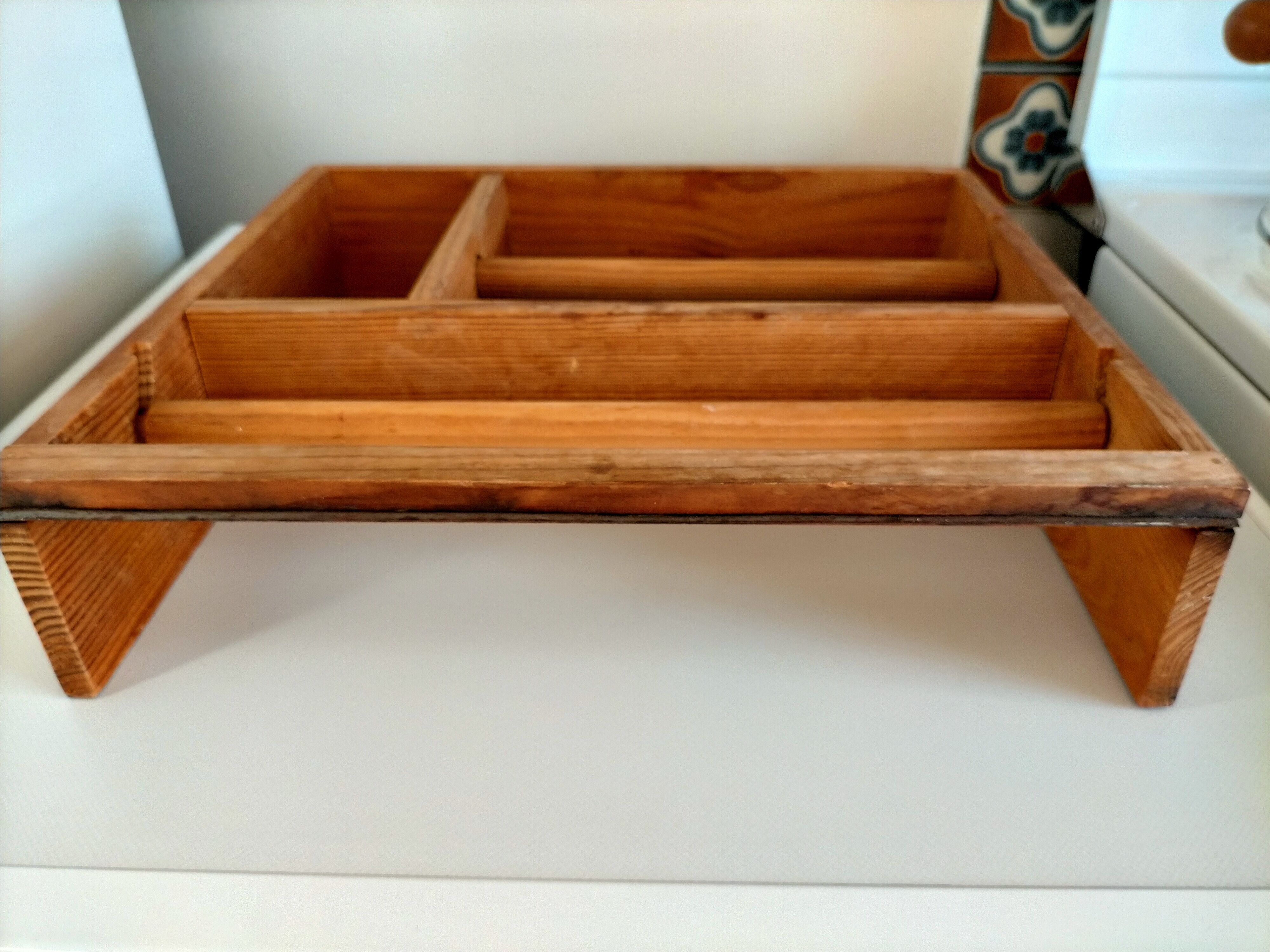 Wooden shelf with unroller wipes everything