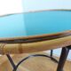Table basse ronde en rotin et métal revisitée