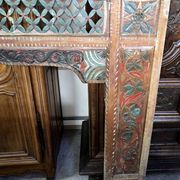 Old façade or decorative frame in carved wood, of Indian origin.