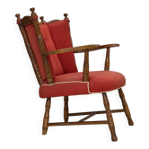 Fauteuil scandinave des années 1960. Laine de meuble rouge, bois de hêtre.