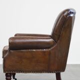 Cognac colored brown grained cowhide chesterfield armchair
