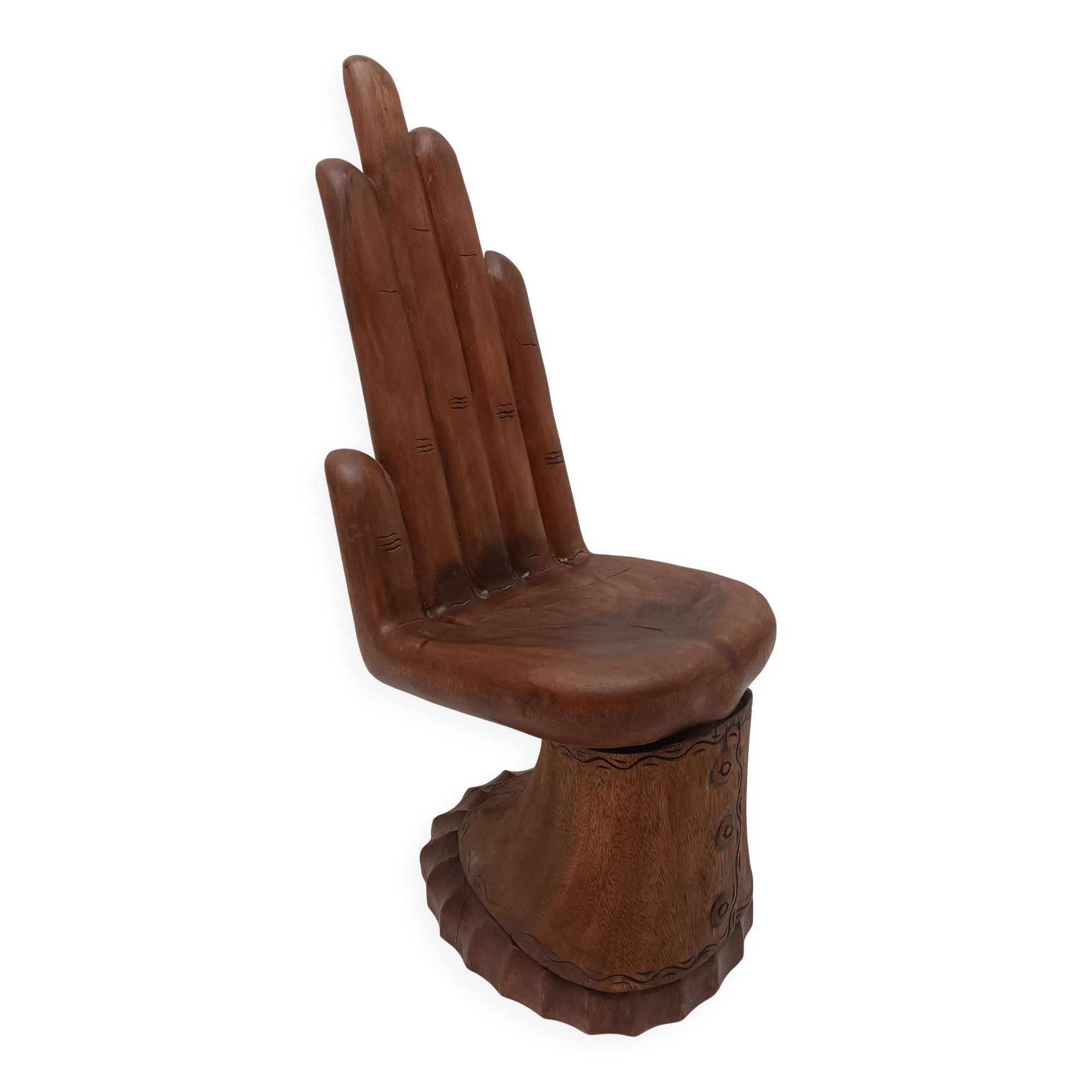 Sculpted wooden chair in the shape of a hand, 1960.