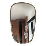Asymmetrical free-form mirror from the 60s
