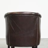 dark cowhide club chair in English style