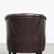 dark cowhide club chair in English style