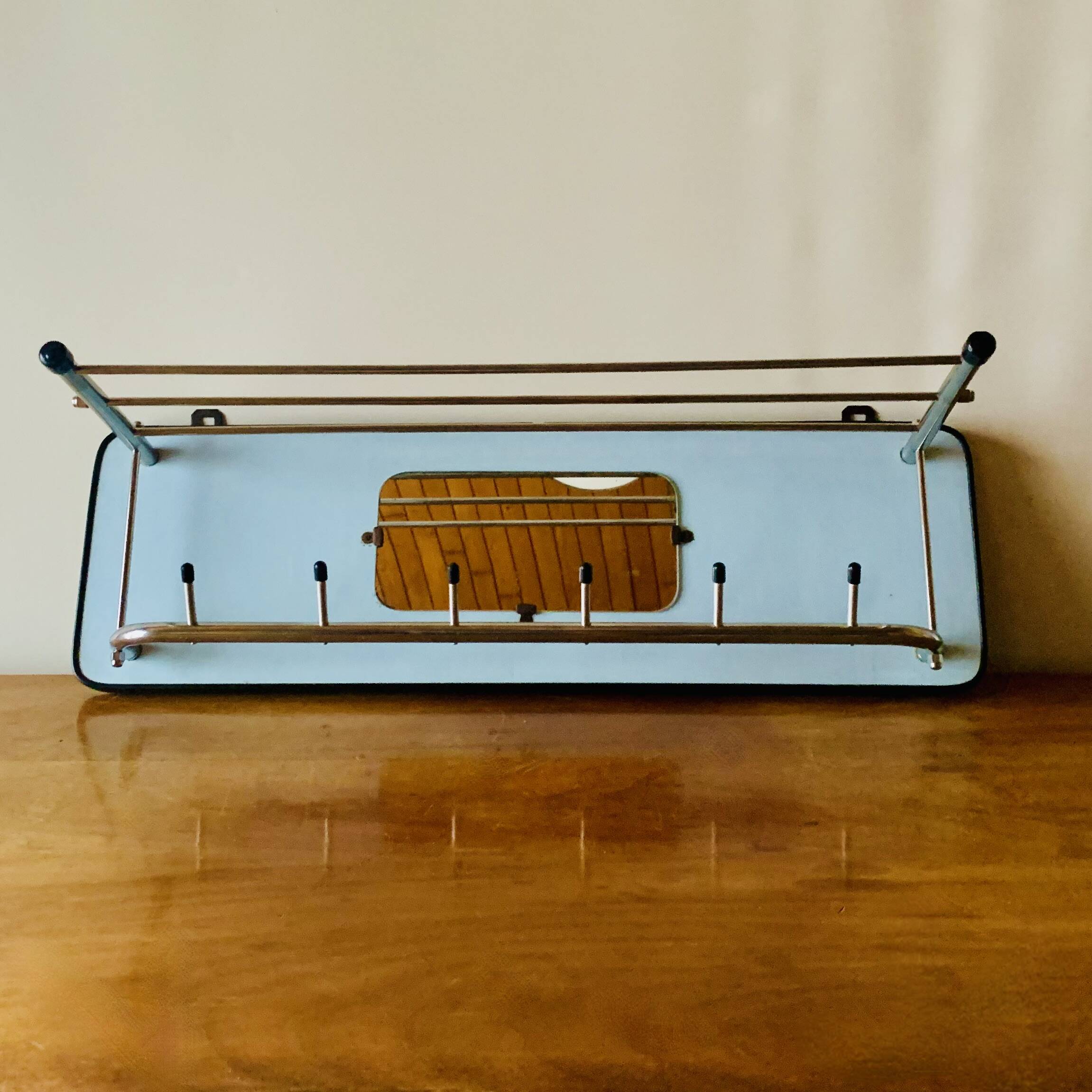 Vintage wall-mounted coat rack in wood and chrome metal with mirror