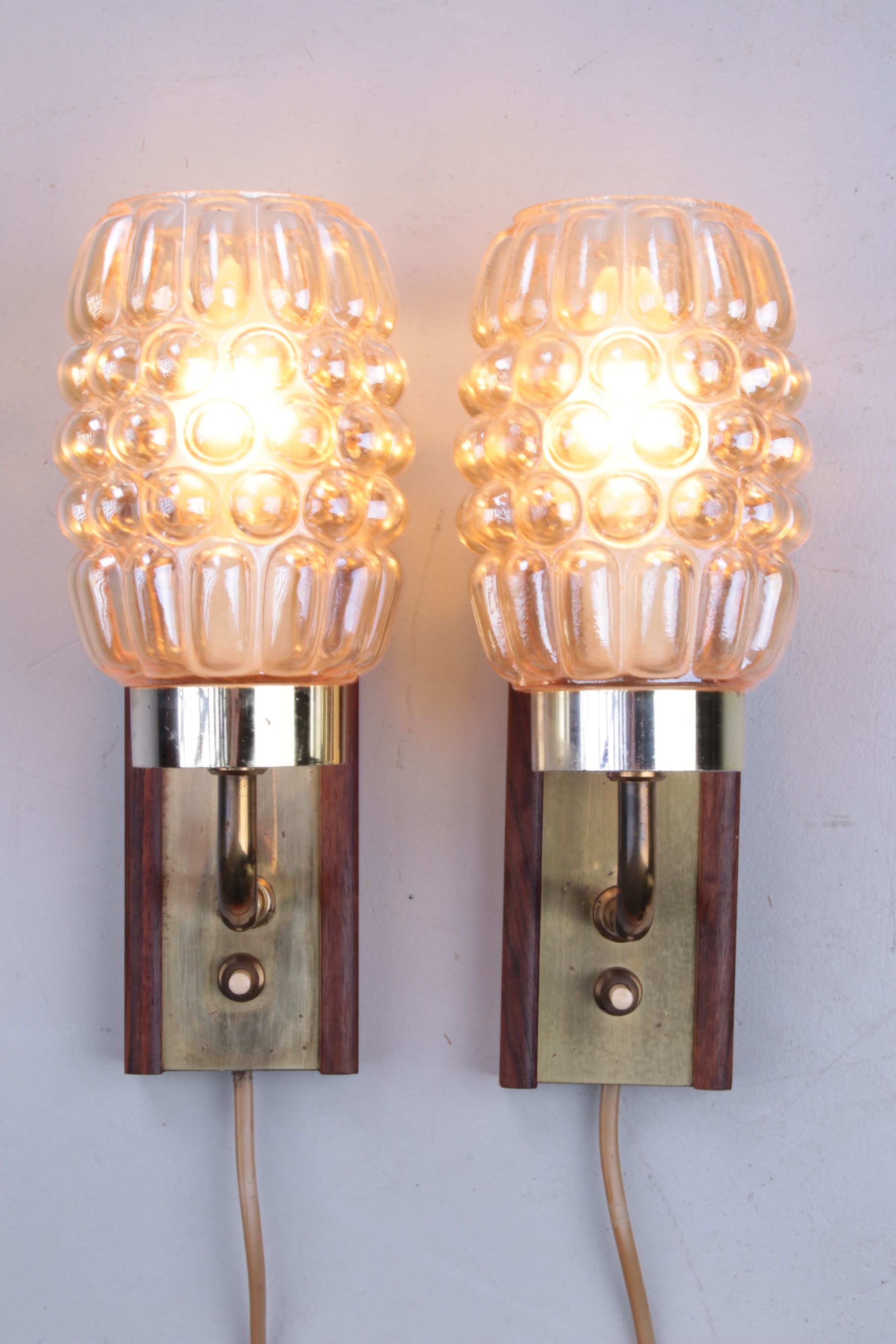 Set Wall lamps Danish teak with brass and glass.