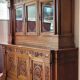 Two-body buffet, made of richly carved solid walnut.