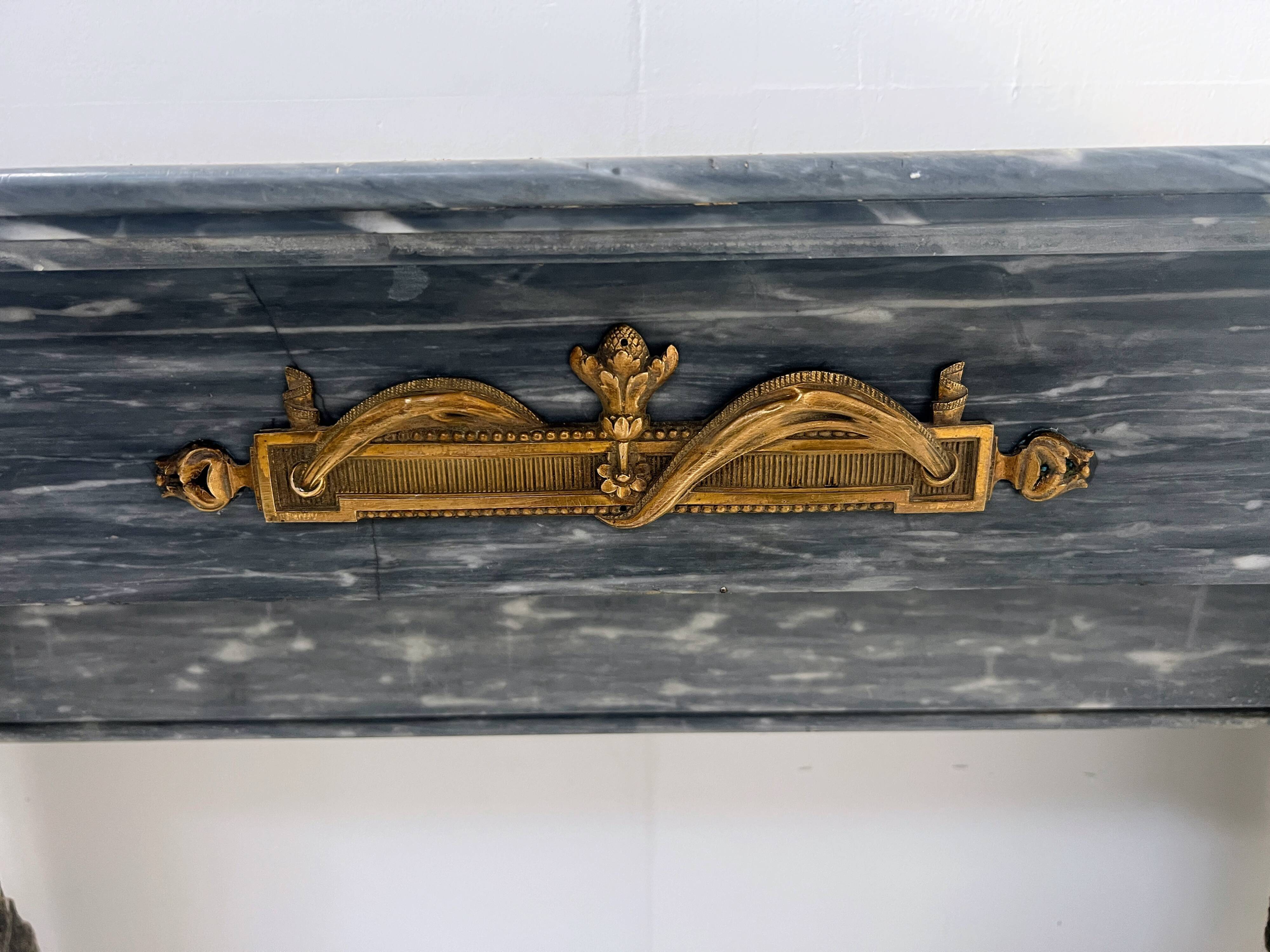 Napoleon III fireplace in blue Turquin marble from the 19th century.