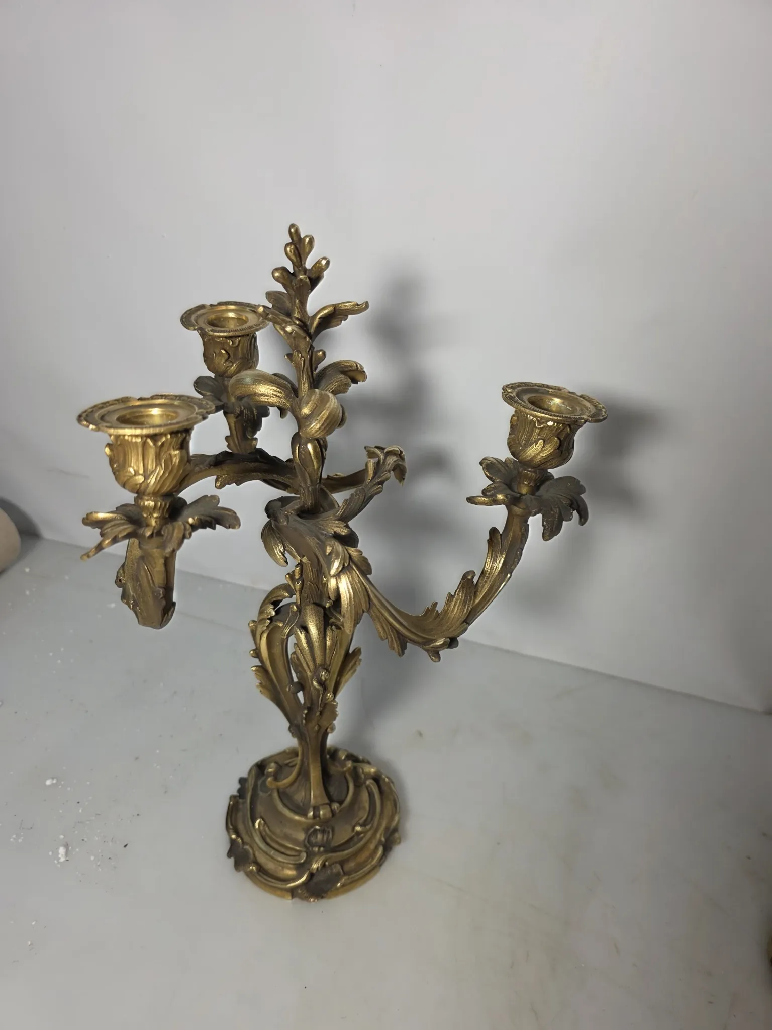Pair of Louis XV style bronze candlesticks from the 19th century.