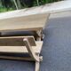 Monastery bench with a 220 cm backrest, renovated in raw solid oak with X legs.