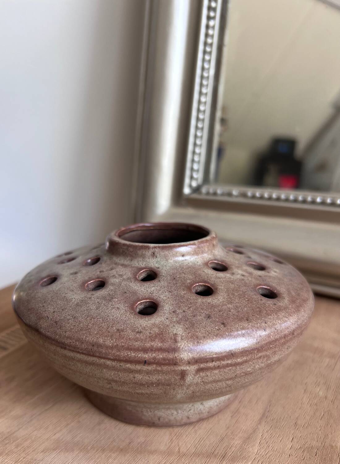 Vintage flower pot in perforated handcrafted stoneware, flattened round shape, p