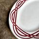 Plat ovale en terre de fer bordeaux
