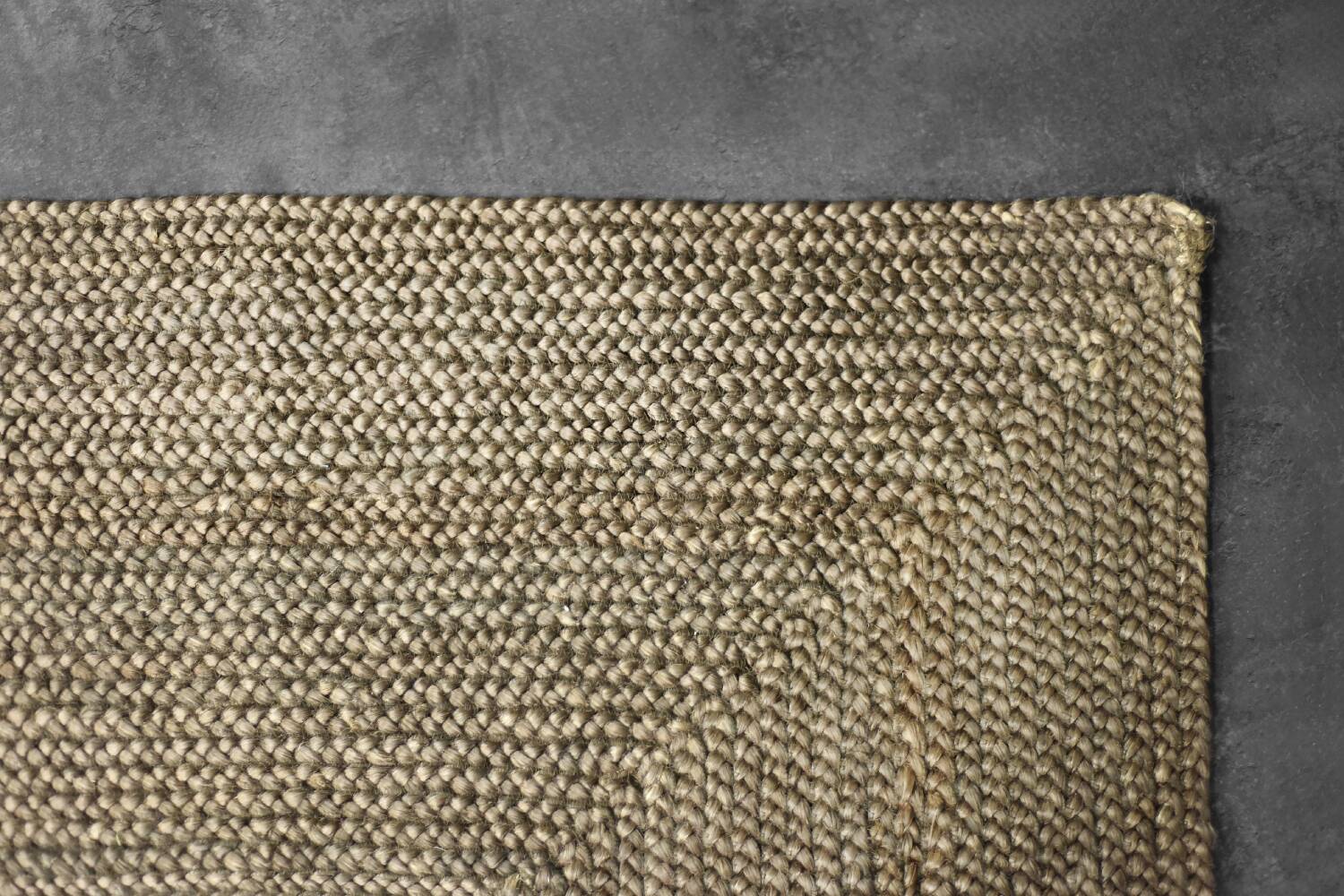 Brown flat-woven jute Indian rug, 1970.