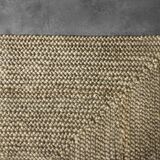 Brown flat-woven jute Indian rug, 1970.