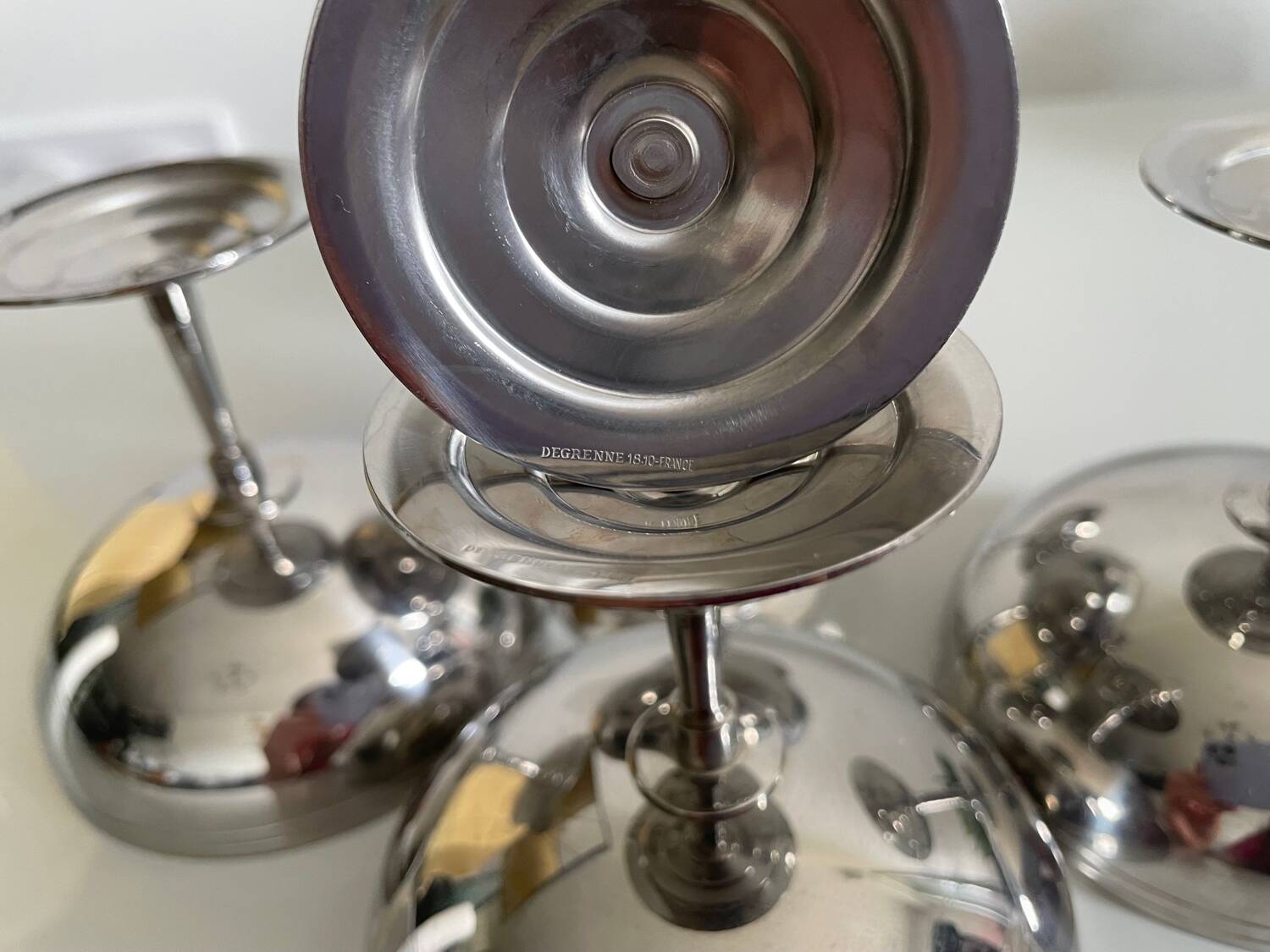 Six Guy Degrenne stainless steel ice cream cups.