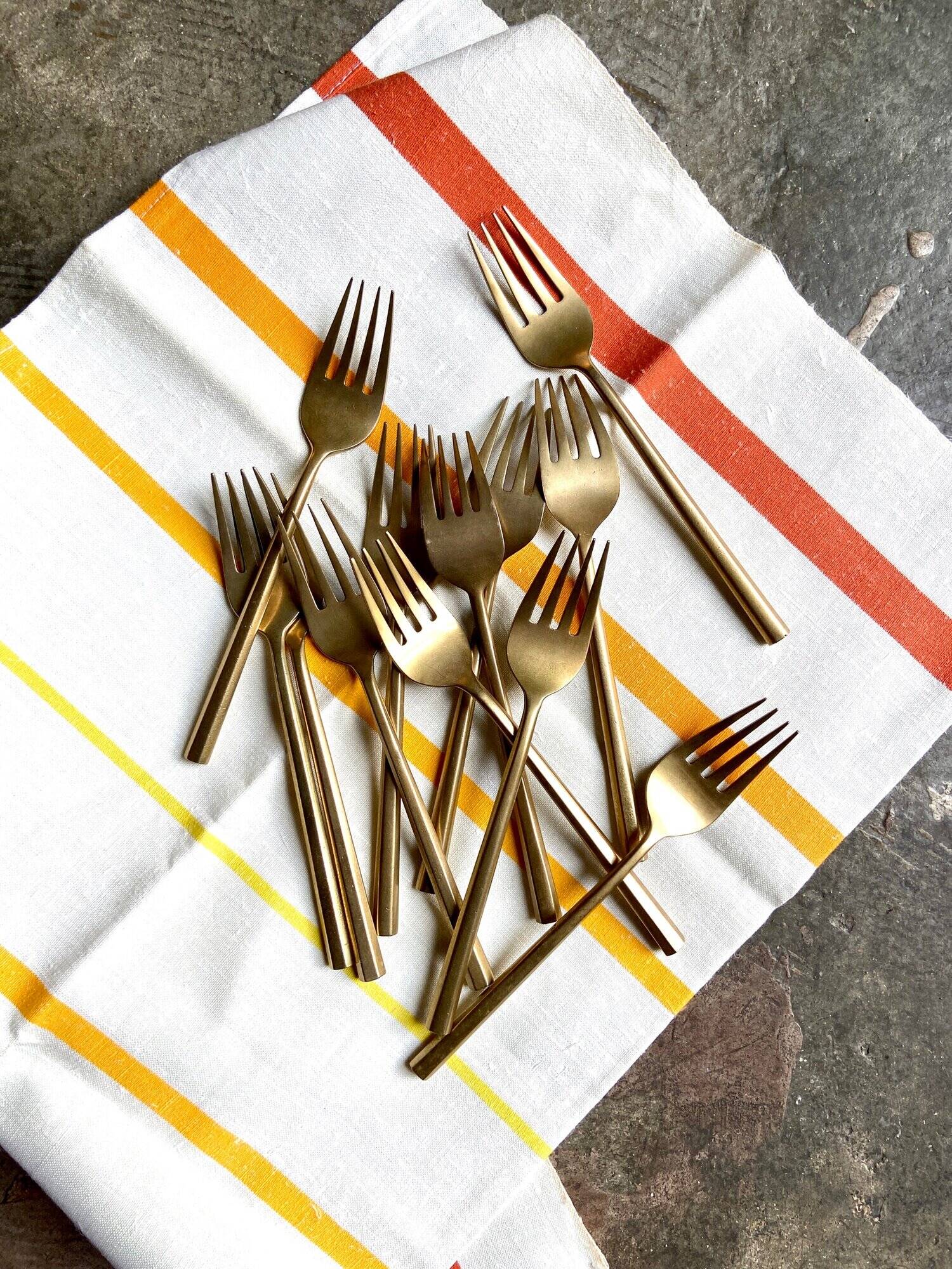 12 gilded bronze forks